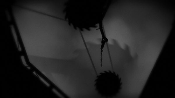 Limbo protagonist navigates between spinning saw blades while hanging onto a rope