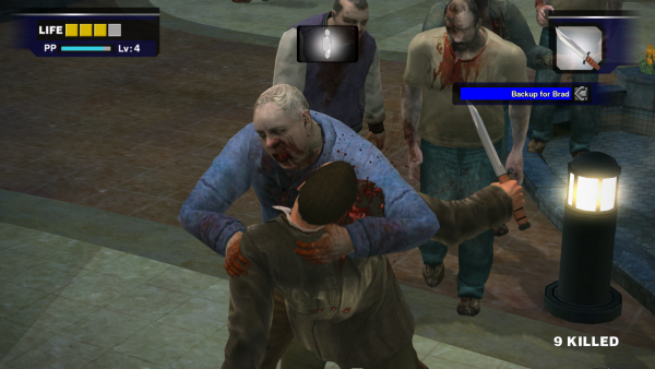 Screenshot of Dead Rising (2006) protagonist Frank West being grappled and bitten by a zombie.