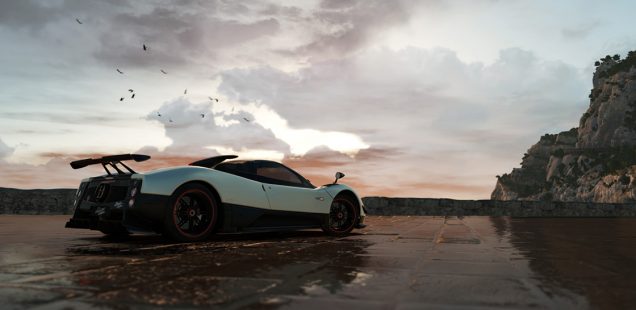 Sportscar is parked in front of a beautiful, painterly skyline